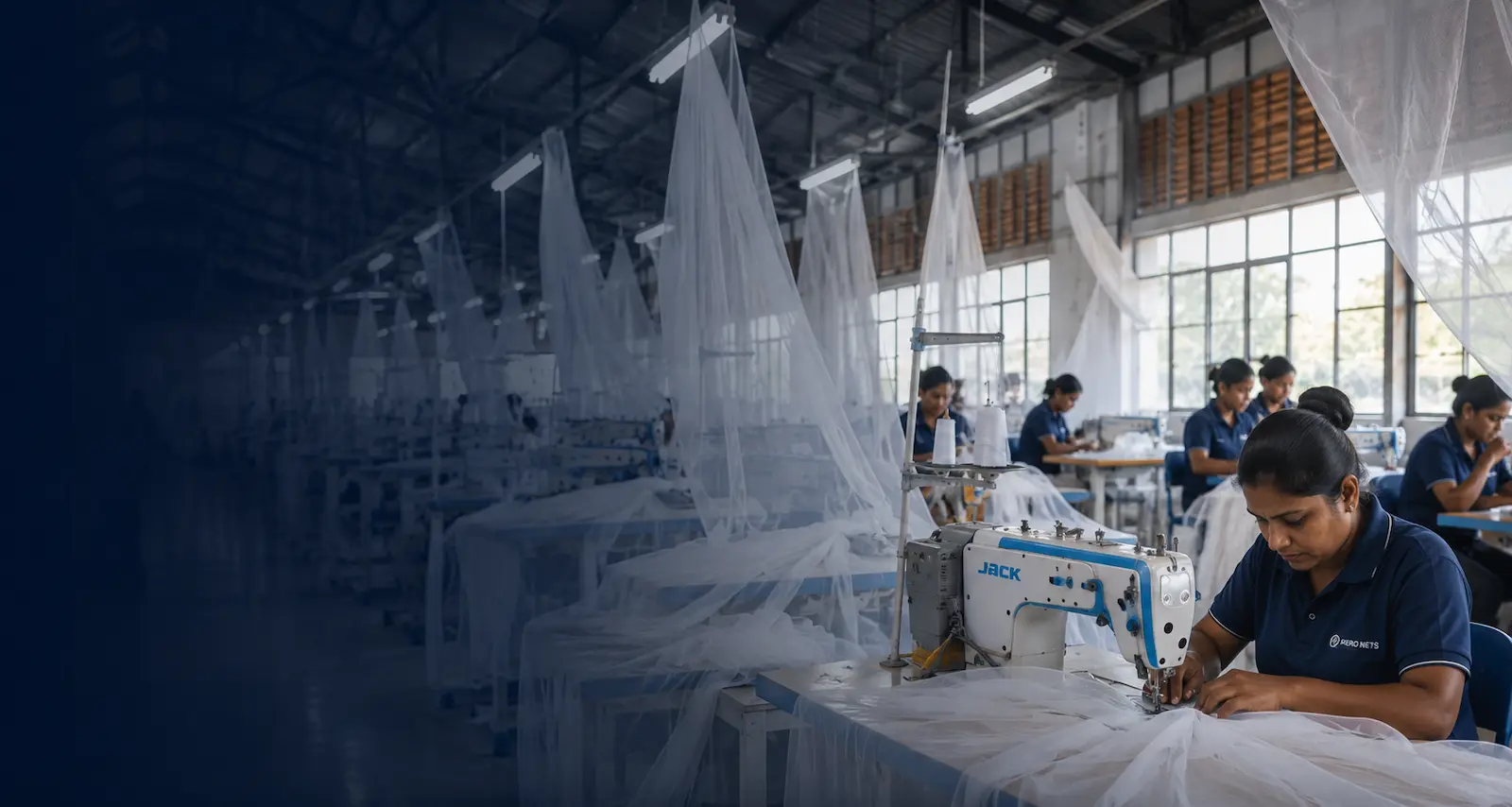 Machinists assembling mosquito nets at scale on the Hero Nets production floor